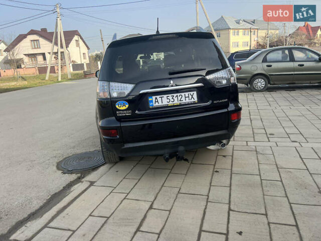 Чорний Міцубісі Аутлендер, об'ємом двигуна 2.36 л та пробігом 244 тис. км за 9850 $, фото 20 на Automoto.ua
