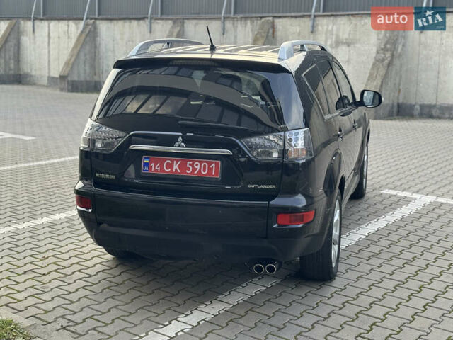Черный Мицубиси Аутлендер, объемом двигателя 2.2 л и пробегом 225 тыс. км за 10950 $, фото 20 на Automoto.ua