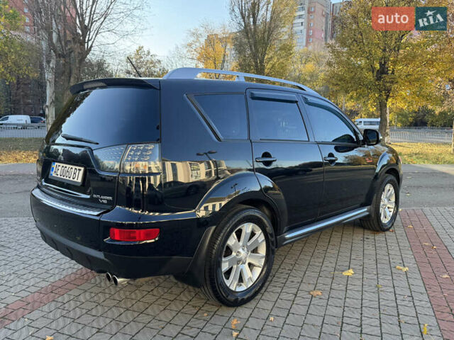 Черный Мицубиси Аутлендер, объемом двигателя 3 л и пробегом 162 тыс. км за 10800 $, фото 5 на Automoto.ua