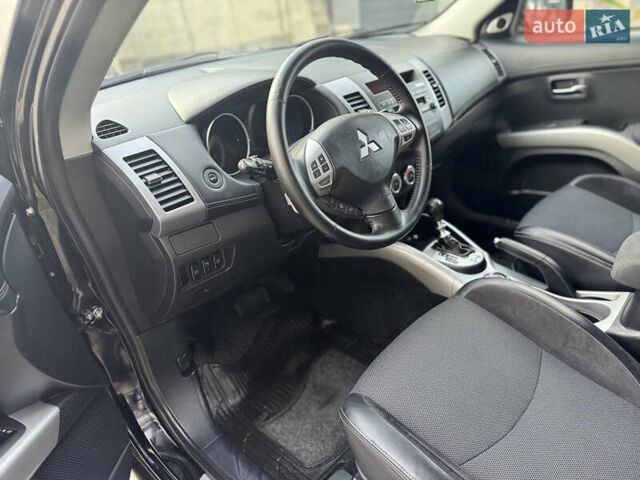 Черный Мицубиси Аутлендер, объемом двигателя 2.2 л и пробегом 225 тыс. км за 10950 $, фото 30 на Automoto.ua