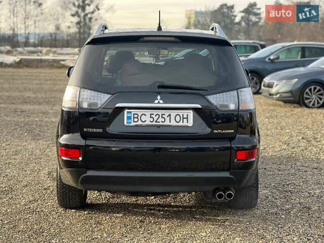Черный Мицубиси Аутлендер, объемом двигателя 2.18 л и пробегом 249 тыс. км за 11500 $, фото 3 на Automoto.ua