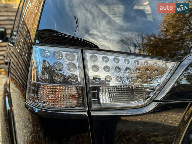 Черный Мицубиси Аутлендер, объемом двигателя 2.2 л и пробегом 226 тыс. км за 11500 $, фото 49 на Automoto.ua