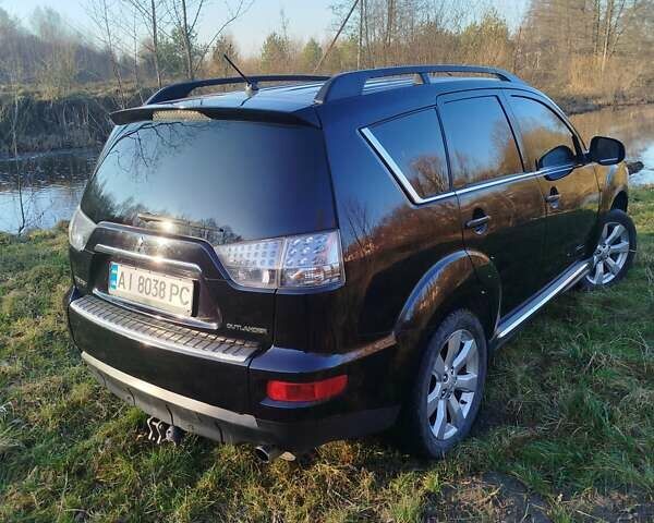 Черный Мицубиси Аутлендер, объемом двигателя 2 л и пробегом 261 тыс. км за 9700 $, фото 13 на Automoto.ua