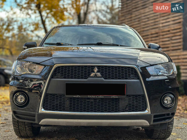 Черный Мицубиси Аутлендер, объемом двигателя 2.2 л и пробегом 226 тыс. км за 11500 $, фото 27 на Automoto.ua