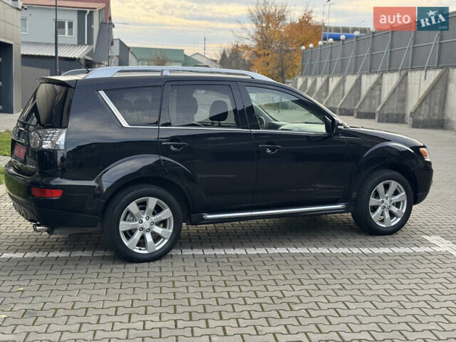 Черный Мицубиси Аутлендер, объемом двигателя 2.2 л и пробегом 225 тыс. км за 10950 $, фото 14 на Automoto.ua