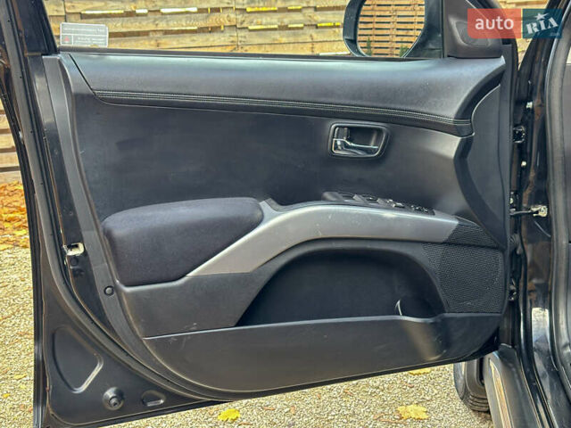 Черный Мицубиси Аутлендер, объемом двигателя 2.2 л и пробегом 226 тыс. км за 11500 $, фото 60 на Automoto.ua