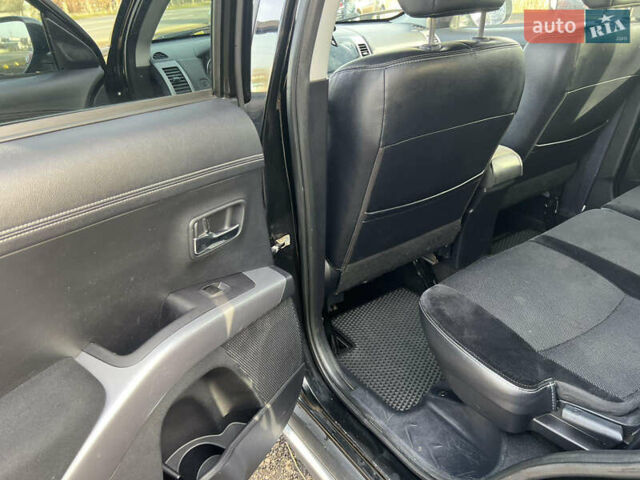 Чорний Міцубісі Аутлендер, об'ємом двигуна 2.36 л та пробігом 244 тис. км за 9850 $, фото 6 на Automoto.ua