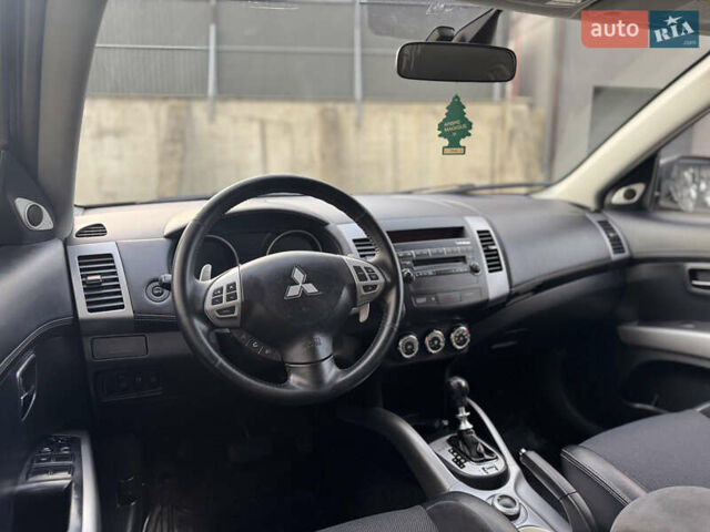 Черный Мицубиси Аутлендер, объемом двигателя 2.2 л и пробегом 225 тыс. км за 10950 $, фото 32 на Automoto.ua