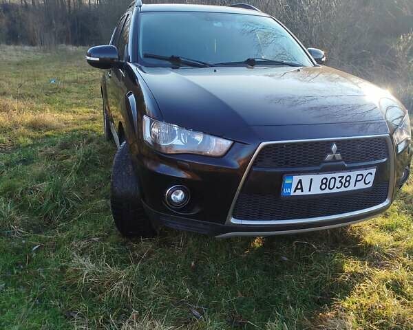 Черный Мицубиси Аутлендер, объемом двигателя 2 л и пробегом 261 тыс. км за 9700 $, фото 5 на Automoto.ua