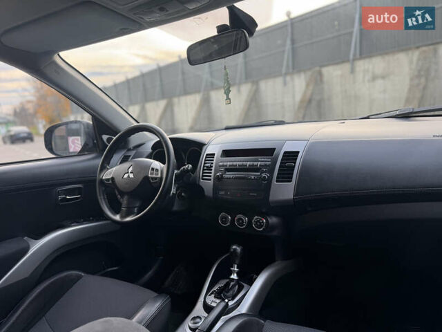 Черный Мицубиси Аутлендер, объемом двигателя 2.2 л и пробегом 225 тыс. км за 10950 $, фото 33 на Automoto.ua