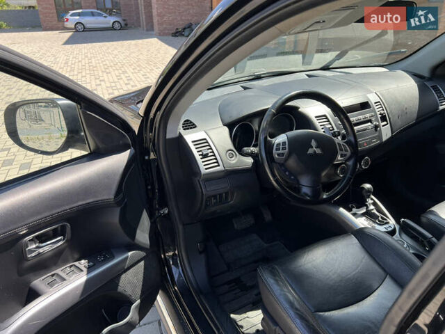 Чорний Міцубісі Аутлендер, об'ємом двигуна 2.2 л та пробігом 214 тис. км за 10600 $, фото 13 на Automoto.ua