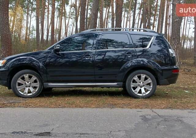 Черный Мицубиси Аутлендер, объемом двигателя 2.2 л и пробегом 267 тыс. км за 9999 $, фото 9 на Automoto.ua