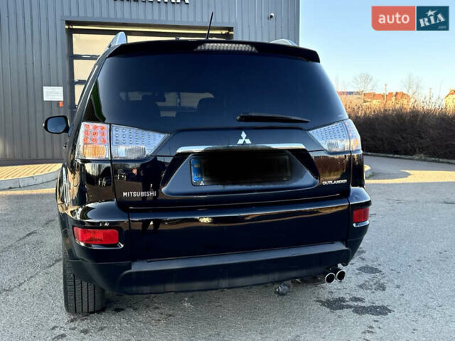 Черный Мицубиси Аутлендер, объемом двигателя 2.2 л и пробегом 263 тыс. км за 11300 $, фото 11 на Automoto.ua