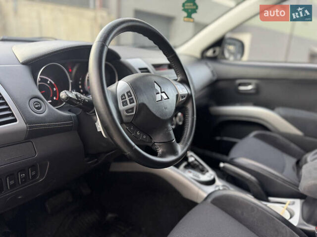 Черный Мицубиси Аутлендер, объемом двигателя 2.2 л и пробегом 225 тыс. км за 10950 $, фото 40 на Automoto.ua