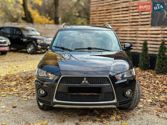Черный Мицубиси Аутлендер, объемом двигателя 2.2 л и пробегом 226 тыс. км за 11500 $, фото 10 на Automoto.ua