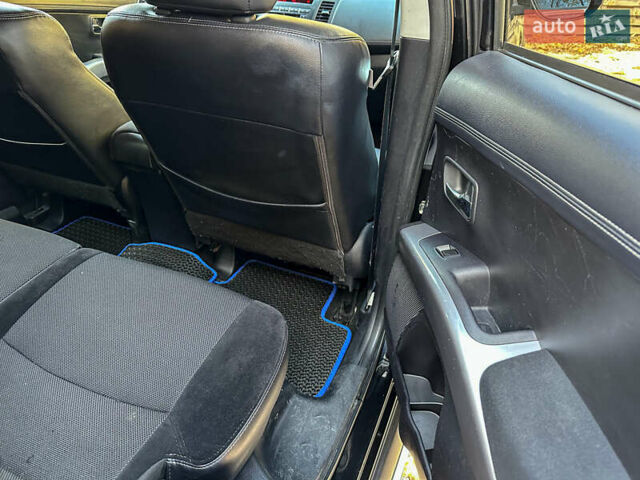 Черный Мицубиси Аутлендер, объемом двигателя 2.2 л и пробегом 226 тыс. км за 11500 $, фото 92 на Automoto.ua