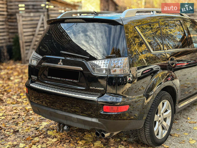 Черный Мицубиси Аутлендер, объемом двигателя 2.2 л и пробегом 226 тыс. км за 11500 $, фото 40 на Automoto.ua