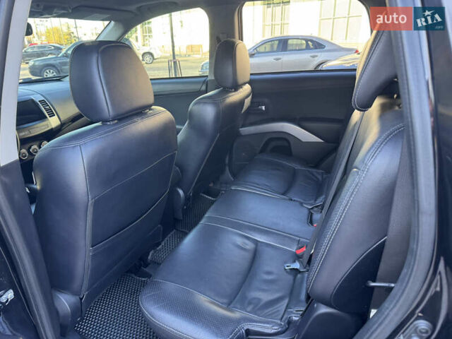 Черный Мицубиси Аутлендер, объемом двигателя 3 л и пробегом 162 тыс. км за 10800 $, фото 12 на Automoto.ua