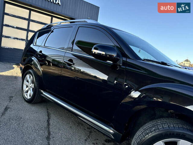 Черный Мицубиси Аутлендер, объемом двигателя 2.2 л и пробегом 263 тыс. км за 11300 $, фото 6 на Automoto.ua