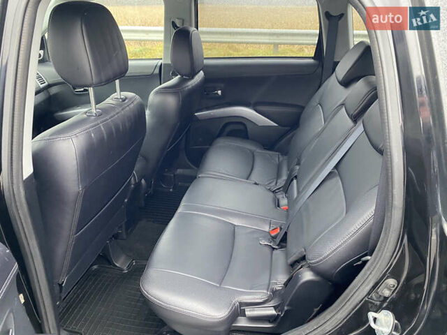 Черный Мицубиси Аутлендер, объемом двигателя 2.2 л и пробегом 227 тыс. км за 10700 $, фото 39 на Automoto.ua