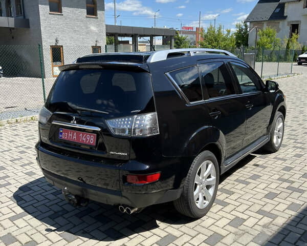 Чорний Міцубісі Аутлендер, об'ємом двигуна 2.2 л та пробігом 214 тис. км за 10600 $, фото 6 на Automoto.ua