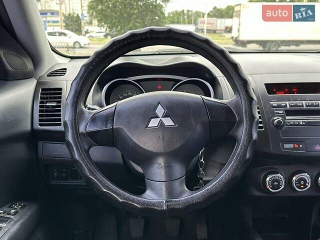 Мицубиси Аутлендер 2010 в Днепре (Днепропетровске) на Automoto.ua Черный Мицубиси Аутлендер, объемом двигателя 2 л и пробегом 220 тыс. км за 8900 $, фото 4 на Automoto.ua