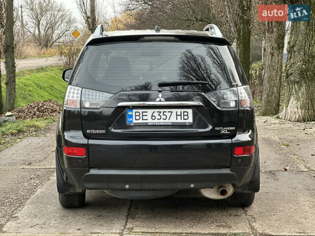 Чорний Міцубісі Аутлендер, об'ємом двигуна 2.36 л та пробігом 197 тис. км за 11300 $, фото 3 на Automoto.ua