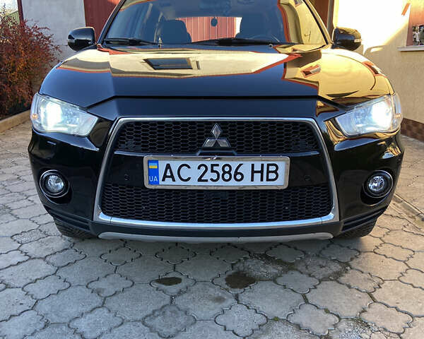 Черный Мицубиси Аутлендер, объемом двигателя 1.97 л и пробегом 292 тыс. км за 10900 $, фото 20 на Automoto.ua