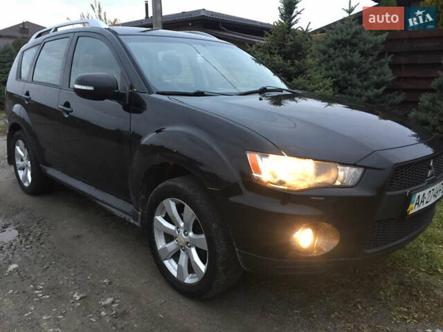 Черный Мицубиси Аутлендер, объемом двигателя 2.36 л и пробегом 315 тыс. км за 9700 $, фото 22 на Automoto.ua