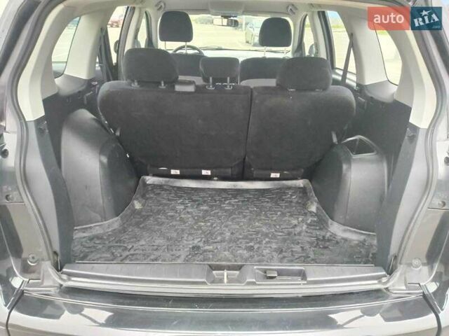 Чорний Міцубісі Аутлендер, об'ємом двигуна 2 л та пробігом 226 тис. км за 10750 $, фото 5 на Automoto.ua