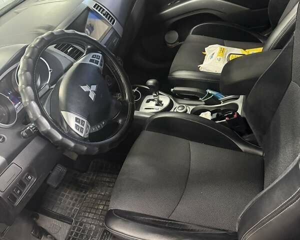 Чорний Міцубісі Аутлендер, об'ємом двигуна 2.4 л та пробігом 187 тис. км за 10200 $, фото 8 на Automoto.ua