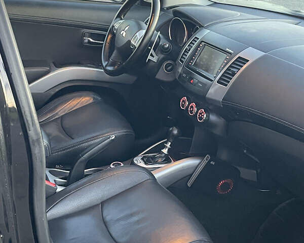 Черный Мицубиси Аутлендер, объемом двигателя 0 л и пробегом 257 тыс. км за 10399 $, фото 32 на Automoto.ua