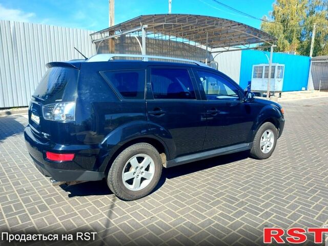 Чорний Міцубісі Аутлендер, об'ємом двигуна 2 л та пробігом 291 тис. км за 11200 $, фото 6 на Automoto.ua