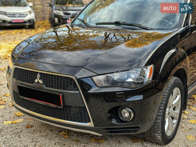 Черный Мицубиси Аутлендер, объемом двигателя 2.2 л и пробегом 226 тыс. км за 11500 $, фото 31 на Automoto.ua