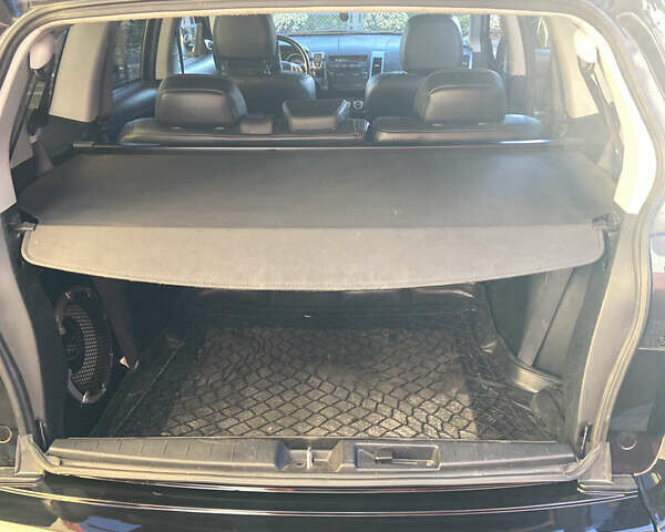 Черный Мицубиси Аутлендер, объемом двигателя 1.97 л и пробегом 292 тыс. км за 10900 $, фото 22 на Automoto.ua