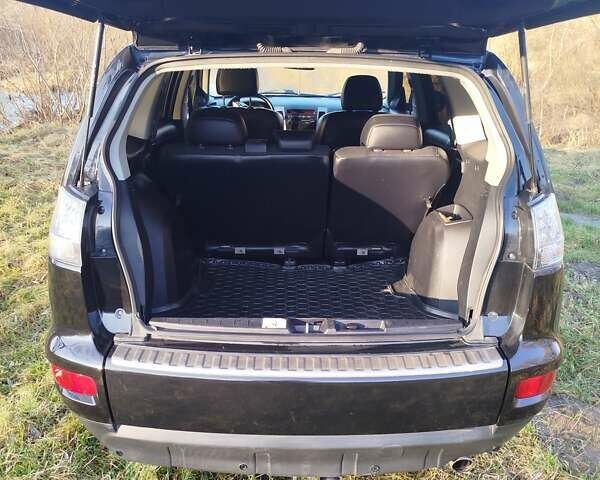 Черный Мицубиси Аутлендер, объемом двигателя 2 л и пробегом 261 тыс. км за 9700 $, фото 10 на Automoto.ua