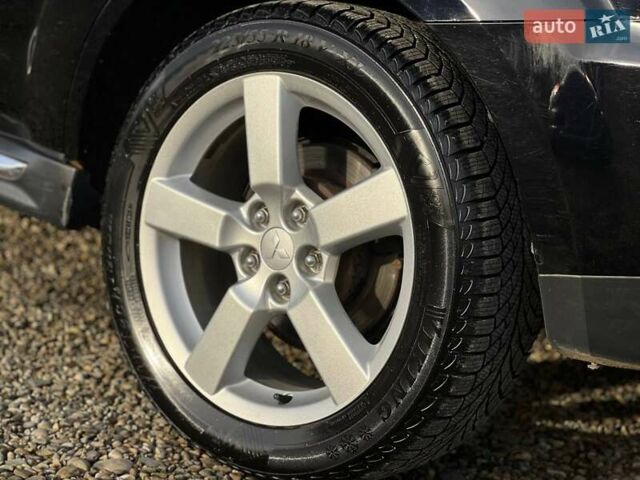 Черный Мицубиси Аутлендер, объемом двигателя 2.18 л и пробегом 249 тыс. км за 11500 $, фото 9 на Automoto.ua