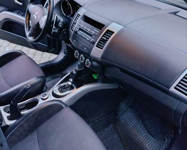 Черный Мицубиси Аутлендер, объемом двигателя 2.2 л и пробегом 225 тыс. км за 11500 $, фото 11 на Automoto.ua