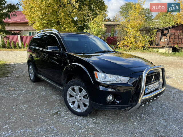 Чорний Міцубісі Аутлендер, об'ємом двигуна 2 л та пробігом 258 тис. км за 8699 $, фото 2 на Automoto.ua