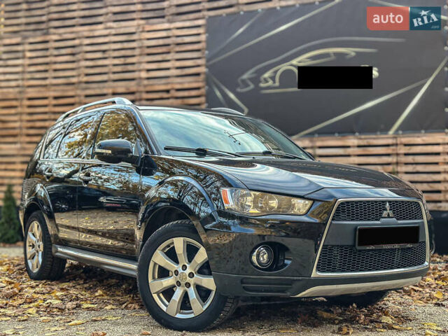 Черный Мицубиси Аутлендер, объемом двигателя 2.2 л и пробегом 226 тыс. км за 11500 $, фото 6 на Automoto.ua