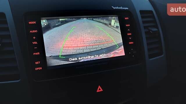 Черный Мицубиси Аутлендер, объемом двигателя 2 л и пробегом 210 тыс. км за 10600 $, фото 36 на Automoto.ua