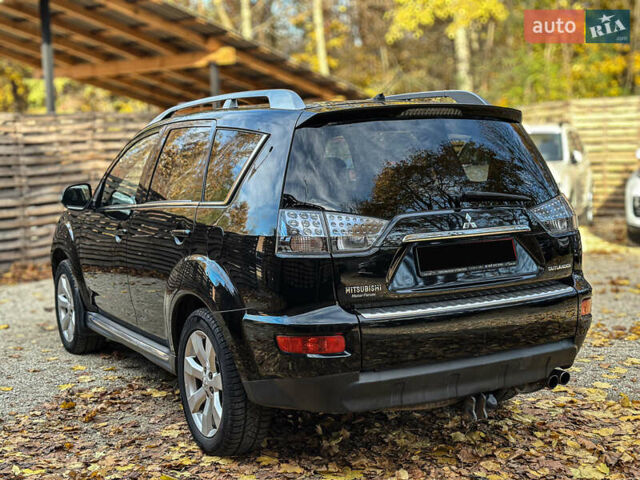 Черный Мицубиси Аутлендер, объемом двигателя 2.2 л и пробегом 226 тыс. км за 11500 $, фото 16 на Automoto.ua