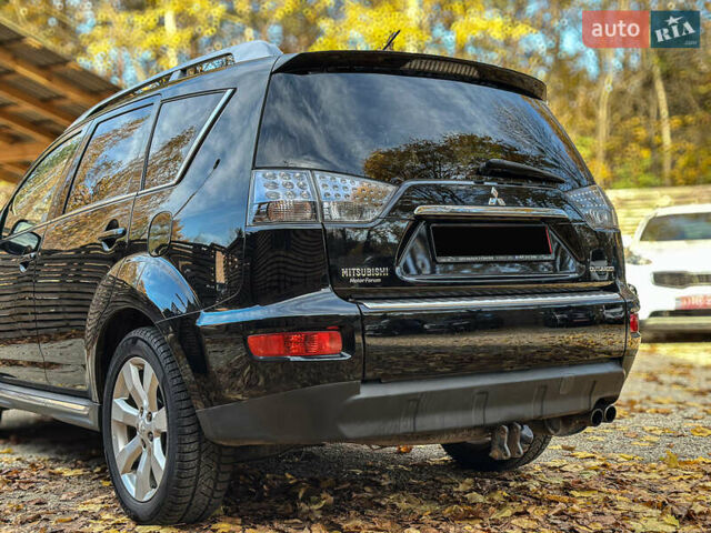 Черный Мицубиси Аутлендер, объемом двигателя 2.2 л и пробегом 226 тыс. км за 11500 $, фото 33 на Automoto.ua