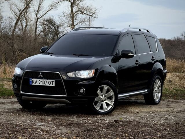 Черный Мицубиси Аутлендер, объемом двигателя 2 л и пробегом 300 тыс. км за 5500 $, фото 3 на Automoto.ua
