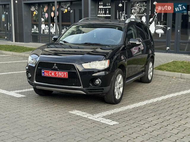 Черный Мицубиси Аутлендер, объемом двигателя 2.2 л и пробегом 225 тыс. км за 10950 $, фото 2 на Automoto.ua