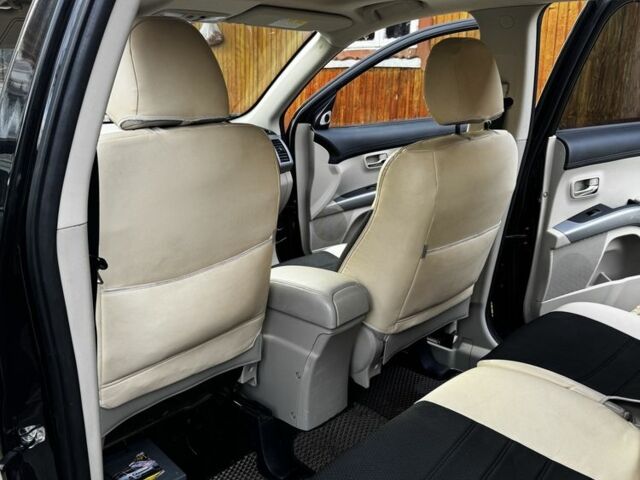 Черный Мицубиси Аутлендер, объемом двигателя 2.2 л и пробегом 249 тыс. км за 11500 $, фото 3 на Automoto.ua