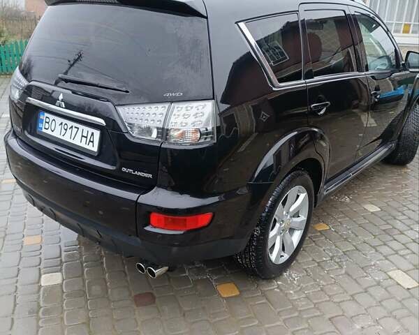 Черный Мицубиси Аутлендер, объемом двигателя 2.2 л и пробегом 225 тыс. км за 11500 $, фото 9 на Automoto.ua