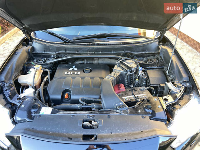 Черный Мицубиси Аутлендер, объемом двигателя 1.97 л и пробегом 292 тыс. км за 10900 $, фото 8 на Automoto.ua