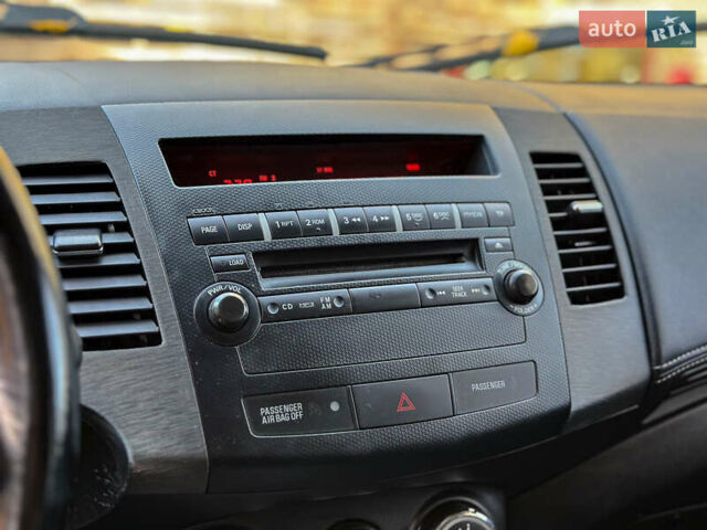 Черный Мицубиси Аутлендер, объемом двигателя 2.2 л и пробегом 226 тыс. км за 11500 $, фото 68 на Automoto.ua