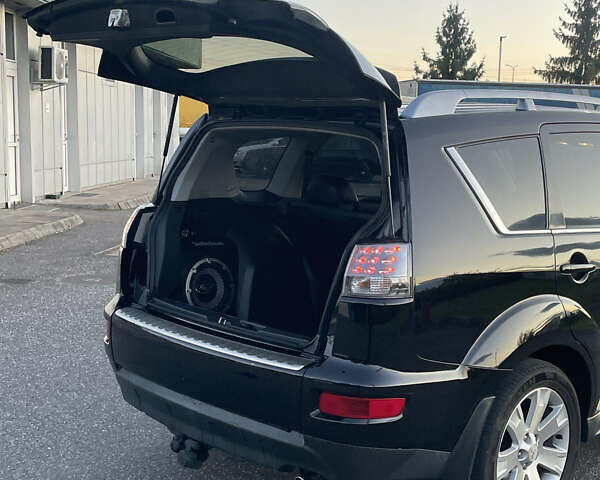 Черный Мицубиси Аутлендер, объемом двигателя 0 л и пробегом 257 тыс. км за 10399 $, фото 28 на Automoto.ua